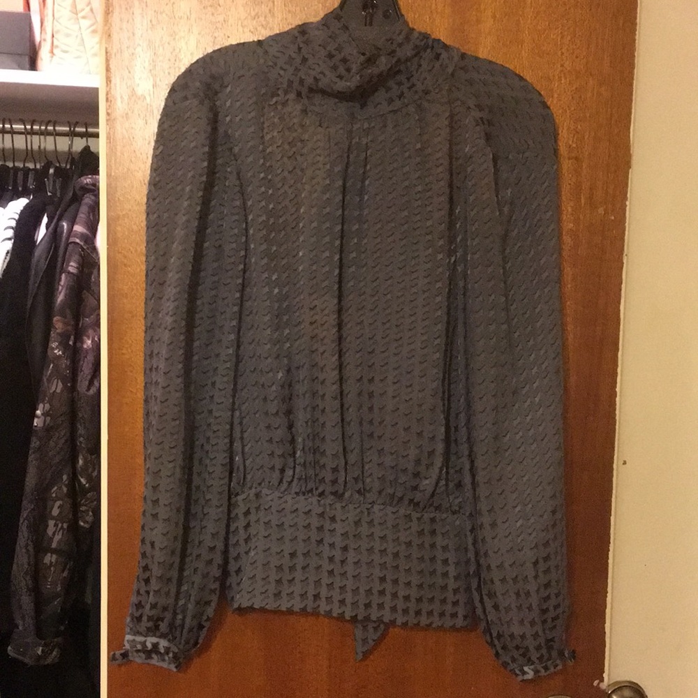 Beautiful silk blouse with an open back